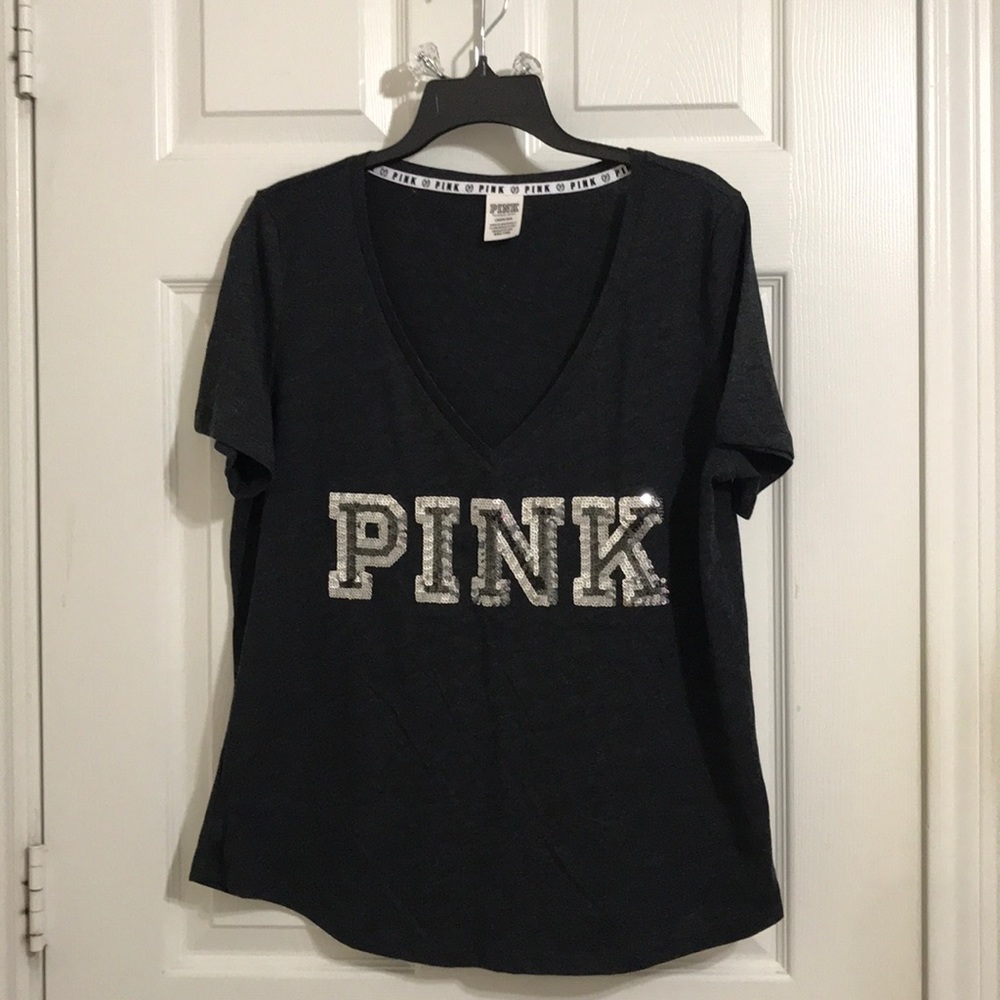 Pink tee shirt with sequence.